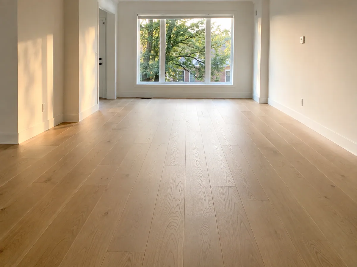 Wide-plank engineered hardwood flooring in a bright Toronto living room